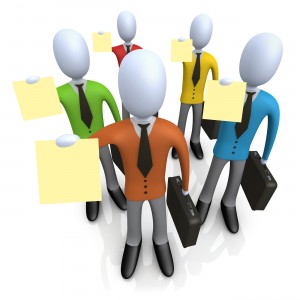 Royalty-free 3d computer generated business graphic of a group of businessmen in colorful shirts, carrying briefcases and holding their resumes up at a job interview. It is a full-color employement clipart picture on a white background.