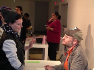 Augusten Burroughs talks with writing students at the book signing.
